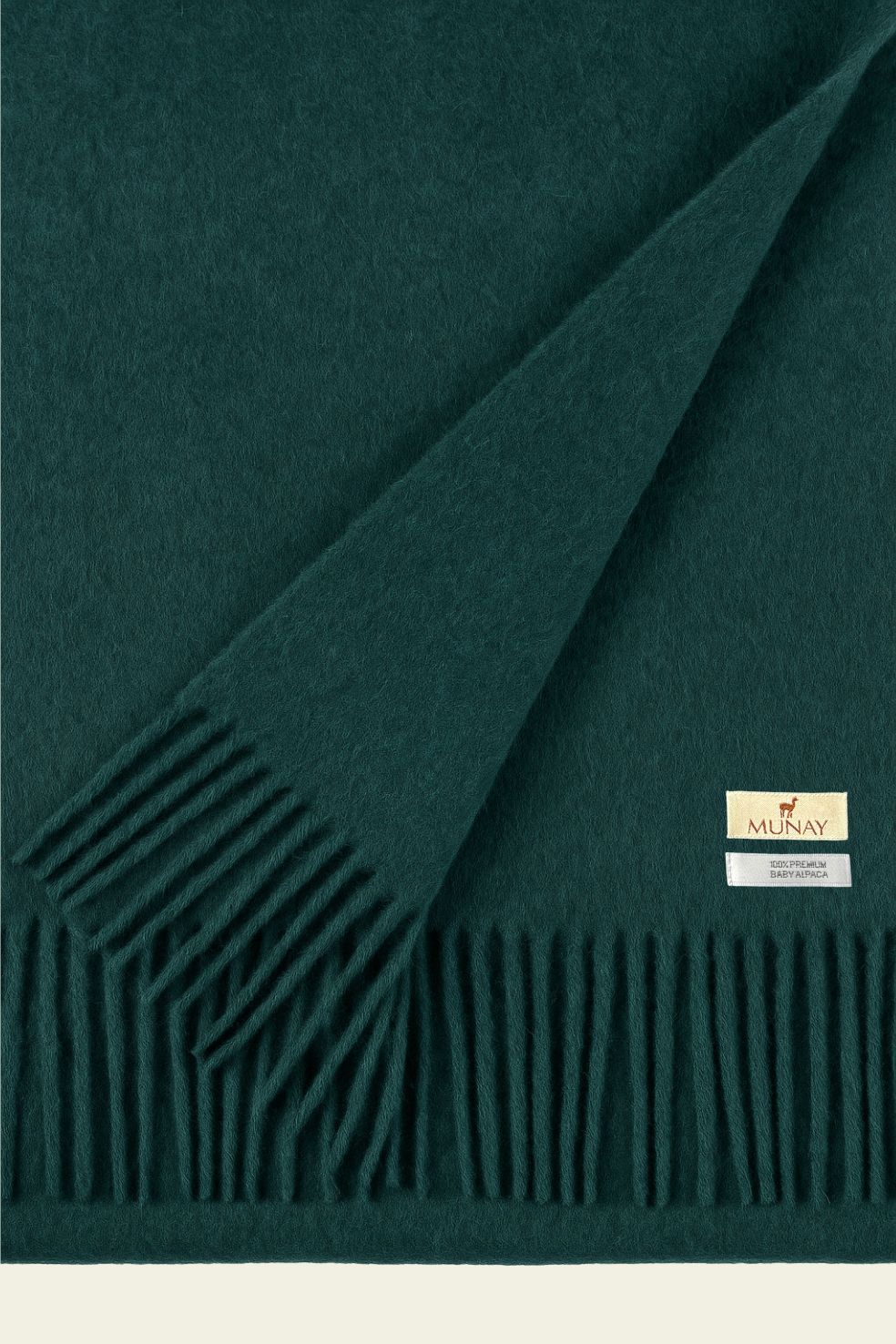 Luxury baby alpaca blanket Kusik in colour forest green, made in Peru by Munay