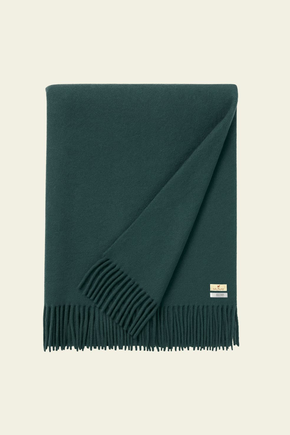 Luxury baby alpaca blanket Kusik in colour forest green, made in Peru by Munay